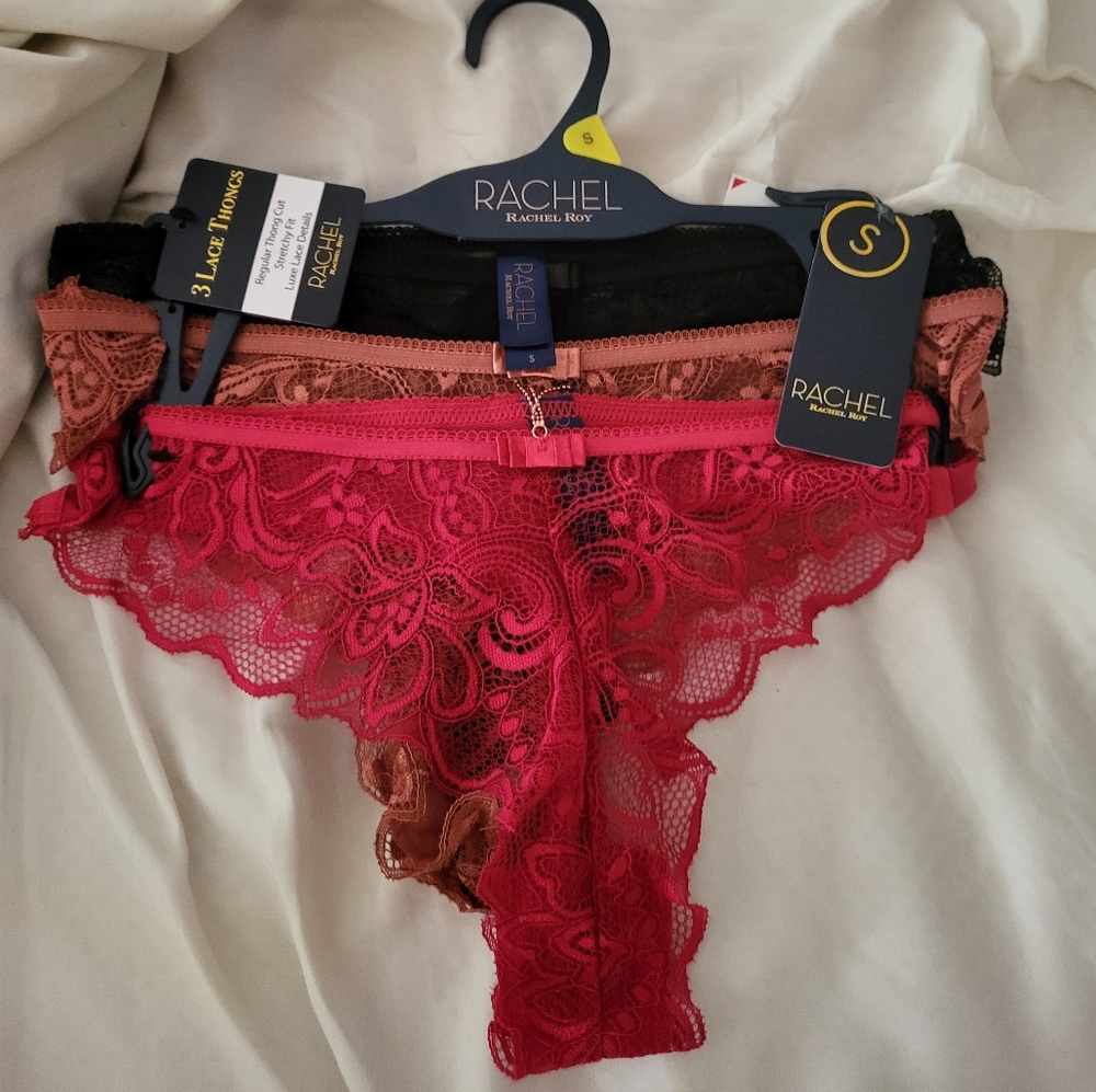 3 pairs of brand new lace thong panties in 3 colors. Black, red and dark peach.